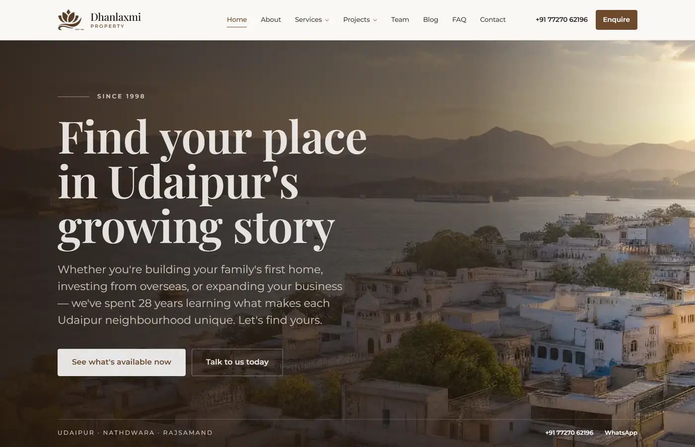 Dhanlaxmi Property homepage — a land development and property advisory firm in Udaipur, Rajasthan, with a lake-city hero and enquiry-led calls to action